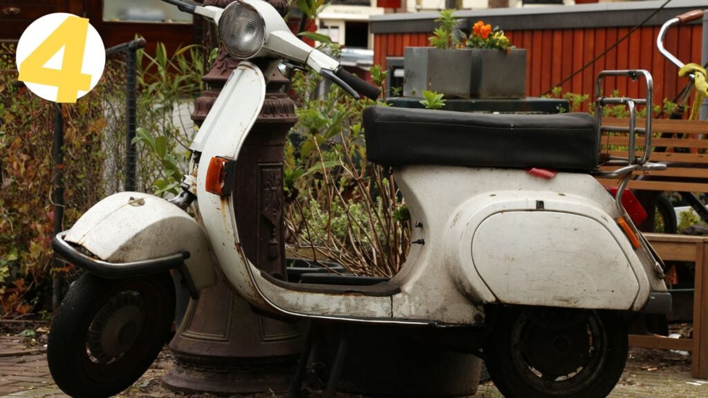 old damaged scooter in the yard