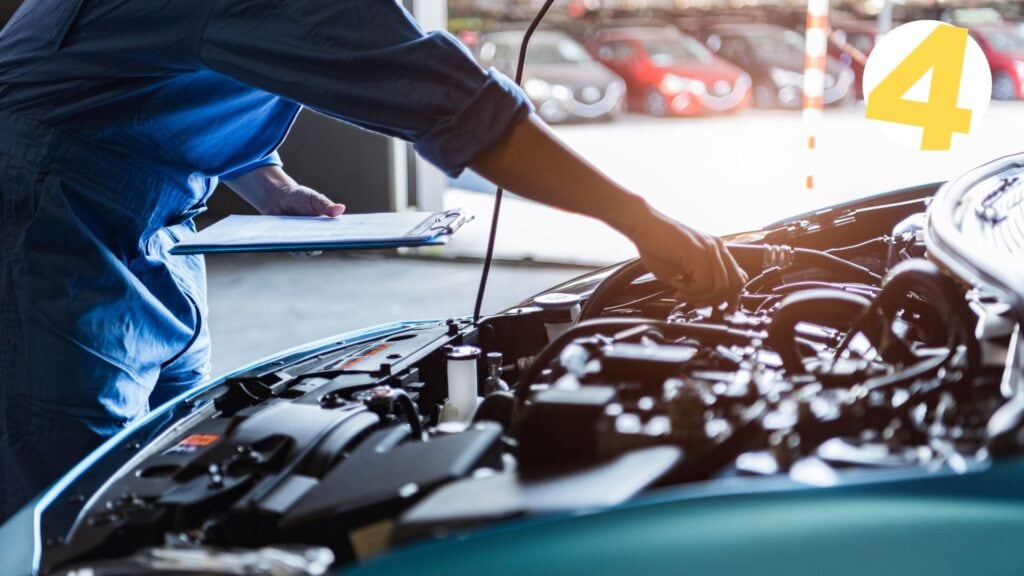 mechanic fixing a car